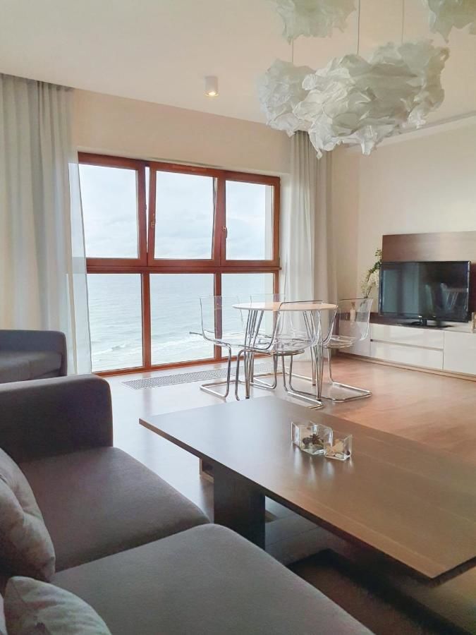 Апартаменты Apartament nad morzem Słońce i Plaża Дзивнувек