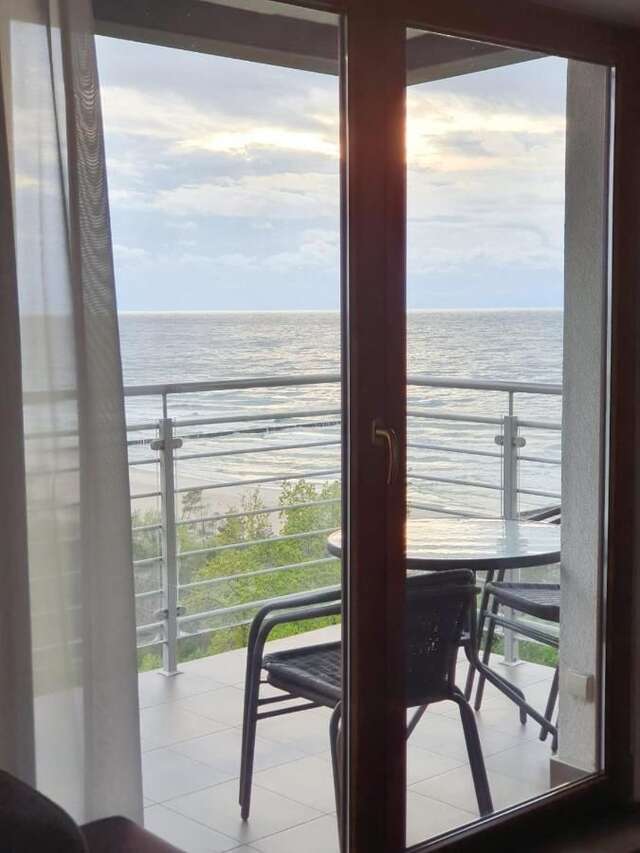 Апартаменты Apartament nad morzem Słońce i Plaża Дзивнувек-18